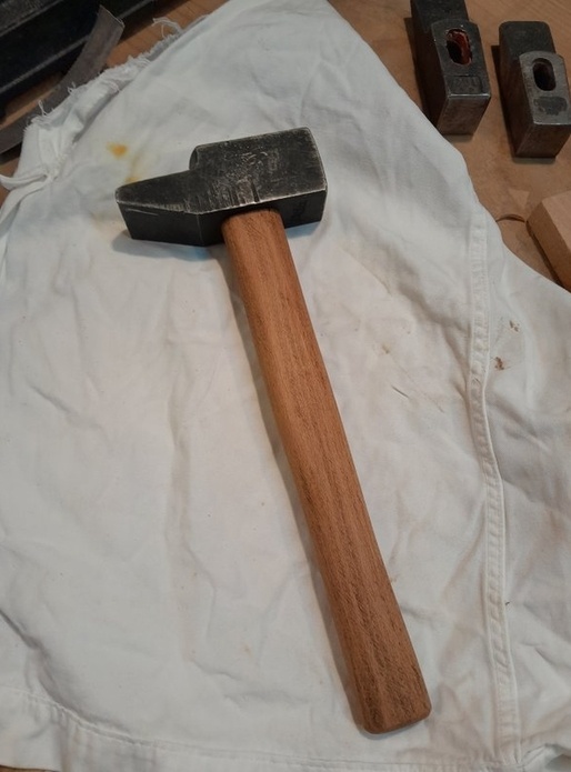 Manche de marteau mal fait