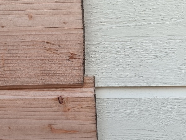 mon choix en bardage mi bois, en arrière la façade d'origine.