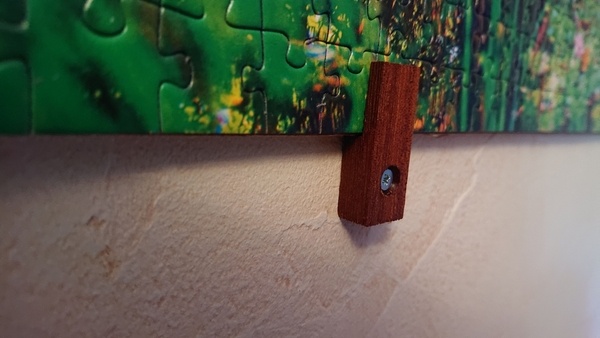 Supports pour accrocher des puzzles au mur