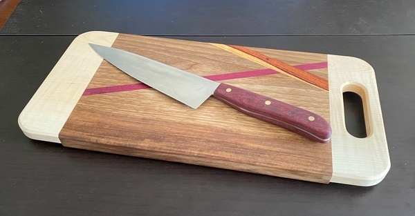 Planche à découper et son couteau