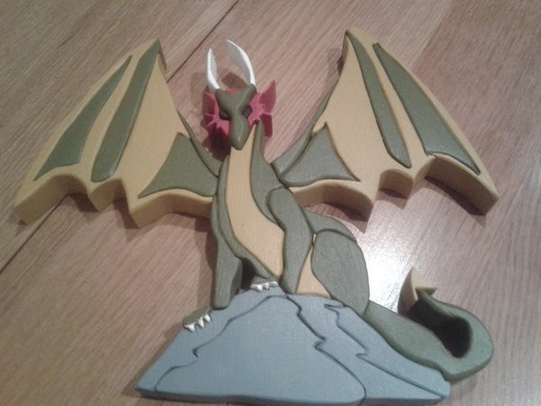 Dragon sur rocher création