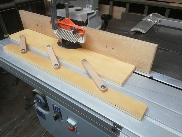 Dispositif de réglage guide toupie