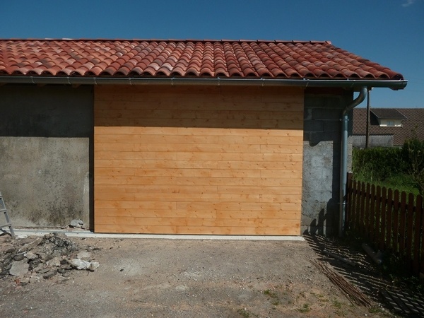 Porte de garage coulissante isolée