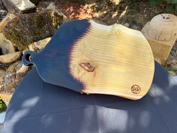 Planche à demi brûlée