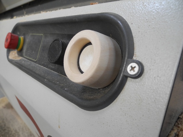 Adaptation de bouton machine