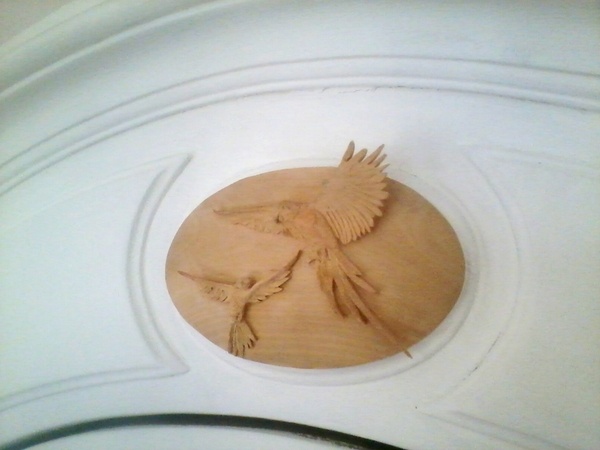 Médaillon aux perroquets