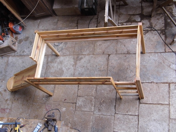 Lit mezzanine toboggan