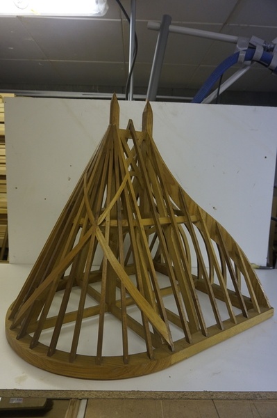 Croix croche dans un quart de tour ronde.