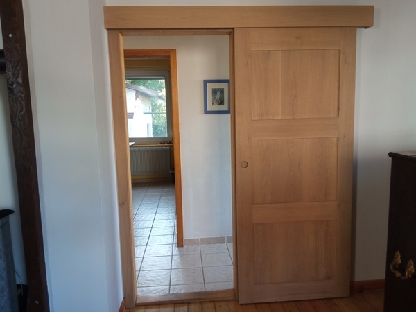 Porte coulissante en chêne