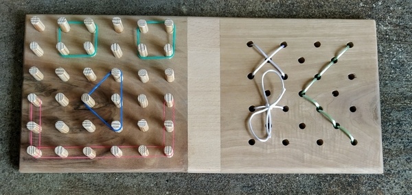 Planche à trous et à élastiques