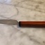 Manche en bois d'un couteau et coquetier