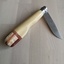 Opinel en buis et mélange de bois