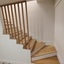 Habillage escalier béton en chêne et son claustra